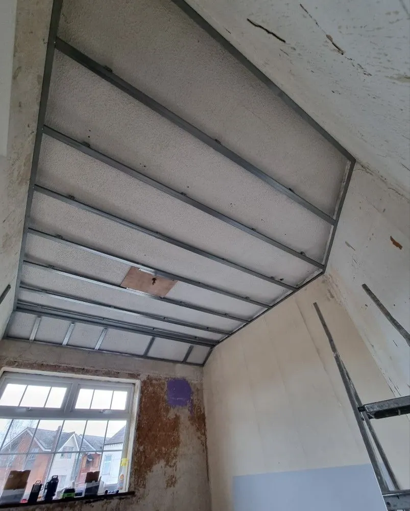 Battens fixed across a conservatory roof before boarding